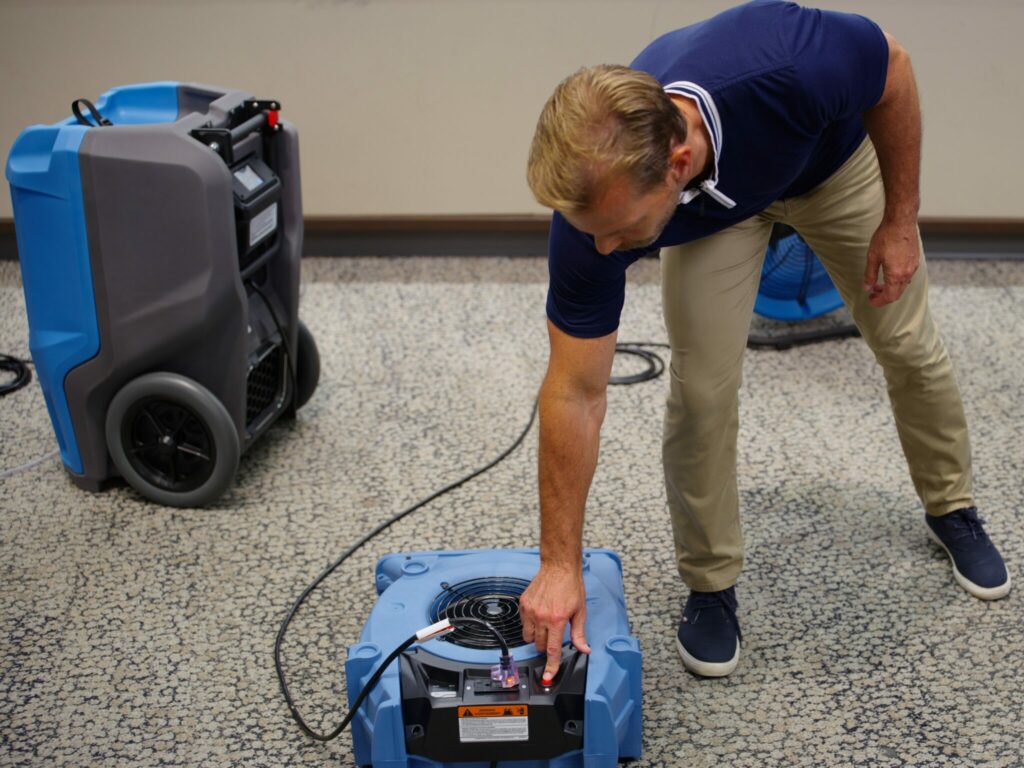 How Dehumidifiers and Air Movers Team Up