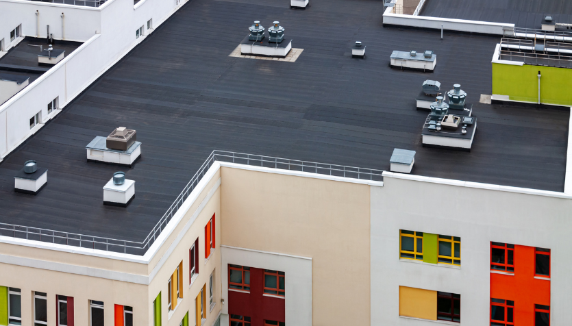 Climate Benefits and Building Energy Efficiency Gains From Improved Roofing Insulation in Cold Climates